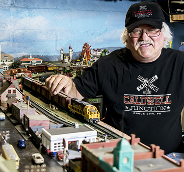 Willie C. showing off his train set