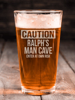 Caution Man Cave : Pint Glasses - Engraved