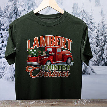 Our forest green Country Christmas tee in contrast to a snowy background