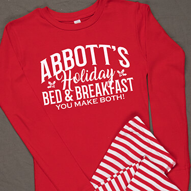 Our Holiday Bed and Breakfast design on a pair of comfy red pajamas