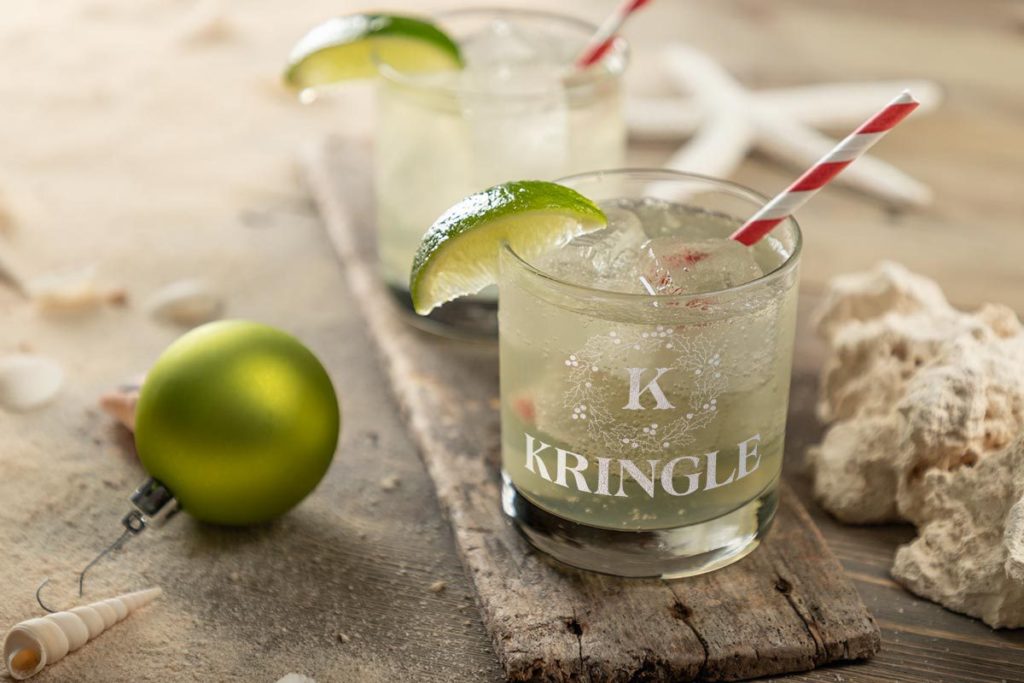 Rocks Glass with homemade ginger syrup and soda water. Garnished with lime and served on the rocks.